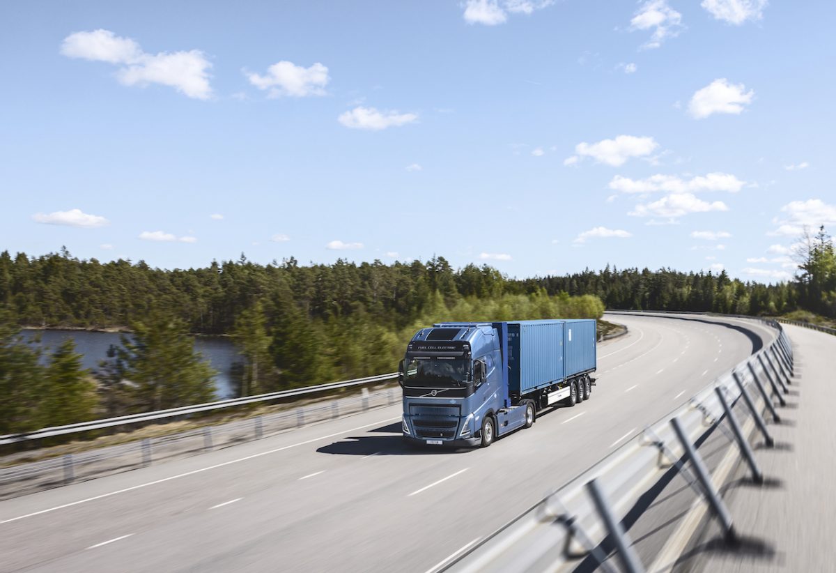 Truck driving on an empty road