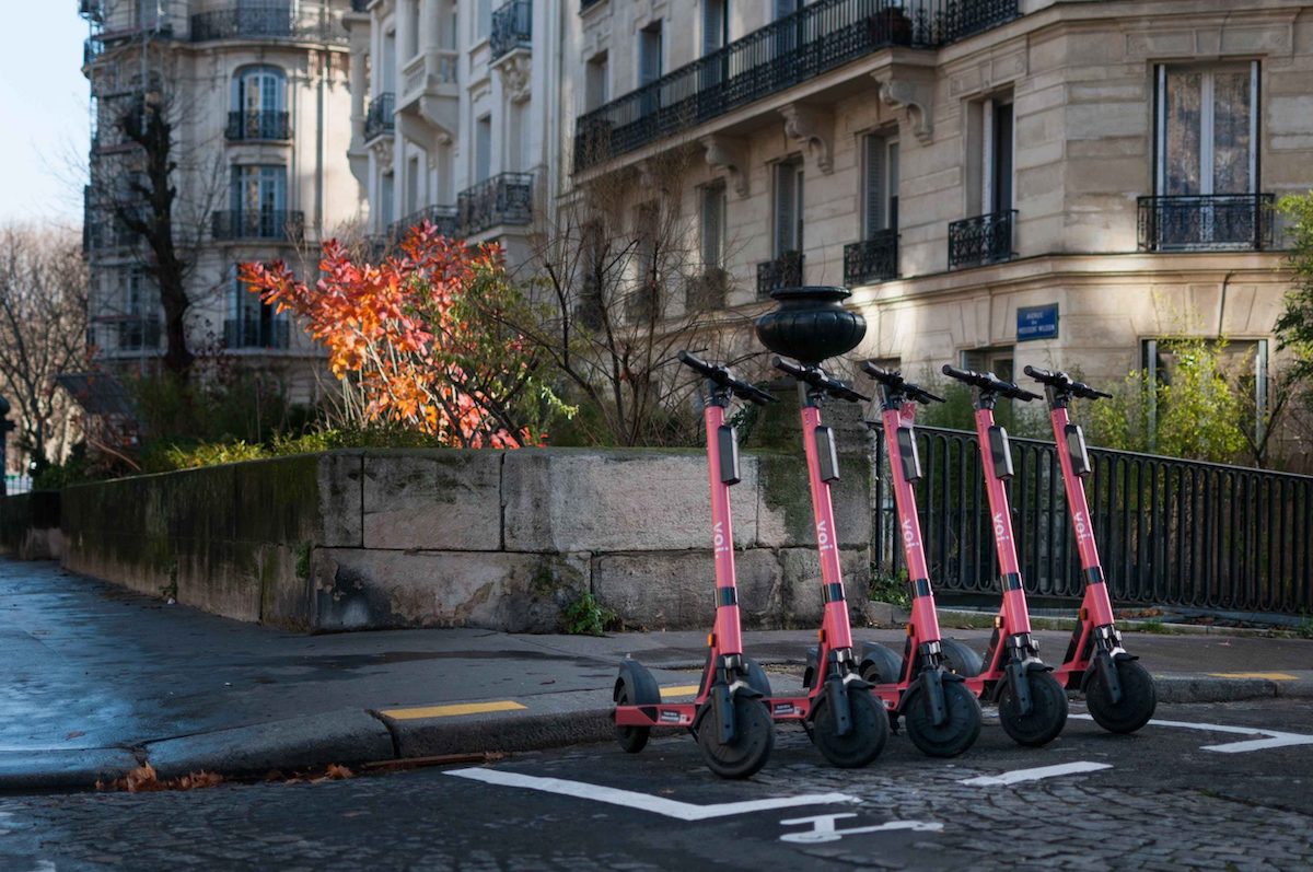 Voi scooters parked